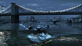 LCPD Police Predators pursue Niko in a Tropic under the bridge.
