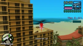 Close to the building.