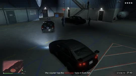 The executive's bodyguards.