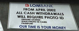 An April 2002 Lombank notice regarding photo ID.