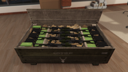 A crate of unloaded Assault Rifles in a GTA Online character's office. Notice the green tint.