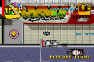 A billboard of K-JAH in the final version GTA Advance, the last bit of evidence of the stations existence carried over from the beta.