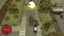 Huang piloting a tank to distract the cops.