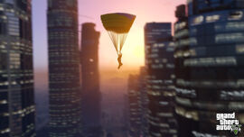 Parachuting through the heart of Los Santos, with the tower in view. (Xbox 360 & PlayStation 3)