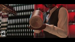 A Diamond Casino & Resort bartender presenting a bottle of  Champagne Diamond