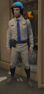 Trevor Philips wearing the cop outfit in Grand Theft Auto V.
