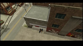 Huang leaves the garage.