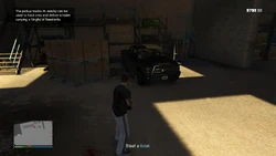 The pickup trucks nearby can be used to hook onto and deliver a trailer carrying a Dinghy or Seasharks