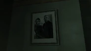 AshleyButlersApartment-TLAD-Portrait.png (766 KB) Portrait of Ashley and Johnny found inside Ashley's apartment in Acter in The Lost and Damned.