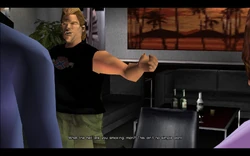 Phil gets up and tells Tommy that he shouldn't be so laid back, as this isn't a simple plan. He then laughs at what he just said and says that a man like himself doesn't need an easy plan, anyway.