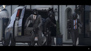 Gunmen get out of the back of the van.
