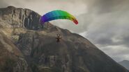 Franklin parachuting with a multi-colored parachute seen in the GTA V gameplay video.