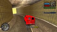 Toni Cipriani driving a van down the completed Shoreside Vale portion of the Porter Tunnels in 1998 from Bringing the House Down