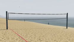 Beach volleyball net outside the country club.