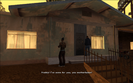 Before the gangbanger can answer, Loc yells at the house and tells the gangbanger - Freddy - that he's 'come for him'.