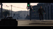 Solomun spots a duffel bag left behind in the middle of the road.
