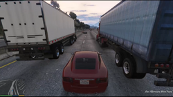 Racing between the trucks.