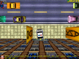 The security guards let the protagonist enter the garage.