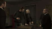 The heist crew in Three Leaf Clover during the first cutscene drinking Stronzo around a table in GTA IV.