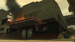 The clubhouse burning as seen in the mission Action/Reaction in The Lost and Damned.