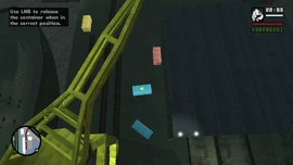 He places the last container.