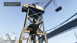 Access the switch at the top of the crane to release Tony McTony's submersible into the water