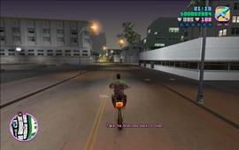 Tommy, about to pick up the money briefcase.