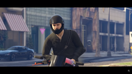 Solomun watches as one of the gunmen looks back at him.