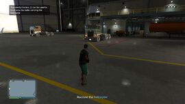 The nearby haulers can be used to hook onto the trailer carrying the helicopter.