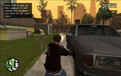 CJ shooting out with the Ballas during Little Weasel's funeral.