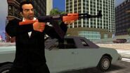 Toni Cipriani firing the Assault Rifle in GTA Liberty City Stories.