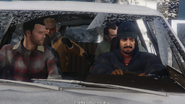 The crew inside the getaway car.
