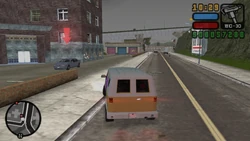 Finding a Forelli car parked in front of an apartment building.