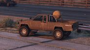 The Rusty Rebel with the Globe movie prop in GTA Online.