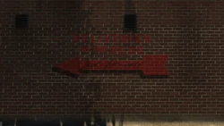 "Deliveries in the Rear" sign.