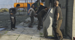 Trevor forcing them into the ice cooler.