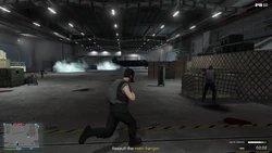 AssaultonATT16-GTAOe-AssaultingMainHangar.png (2.41 MB) Assaulting the main hangar.