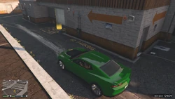 Returning the vehicle to the rear garage.