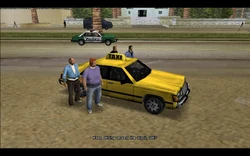 The crew gets out of the taxi and Tommy asks Hilary to keep driving around the block while they carry out the bank robbery.