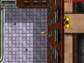 Keith can be seen on the top of the building preparing to jump off.