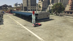 Going around the blue pillar at the back of the bus center