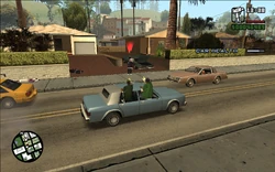 The gang performing a drive-by on another group of Ballas.