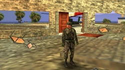 A military soldier at the ruins of the Ristorante Ecoli.