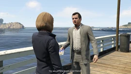 FrankMathers-GTAV-AbigailHandingPhotoToMichael.png (1.61 MB) Abigail handing Frank Mathers' photo to Michael.