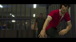 The player throwing a bail escapee in a holding cell