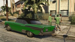 A street view with DNF members in the foreground.