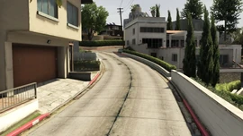 Western side of the street.