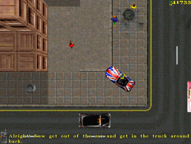 Parking outside his hideout. The protagonist is told to enter the TV Van behind the warehouse.