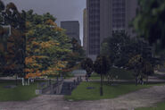 The central portion of the part, as viewed to the east, GTA III. The entrance to the underground toilet and an obelisk are visible.