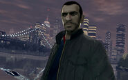 Niko Bellic with the Algonquin Bridge in the background. The Algonquin skyline lights up in the distance.